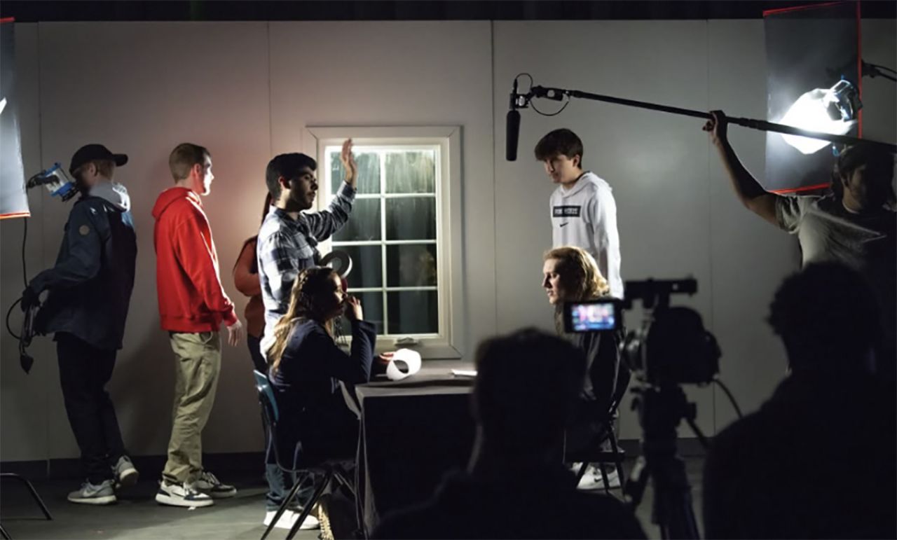 Students work on a film set