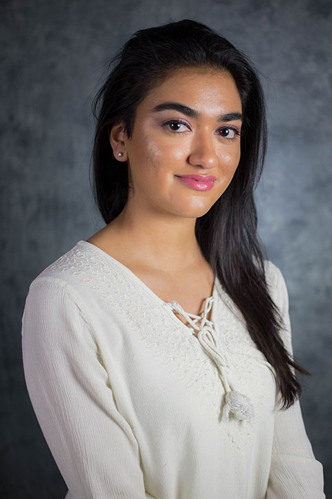 Studio headshot for Ayra Siddiq