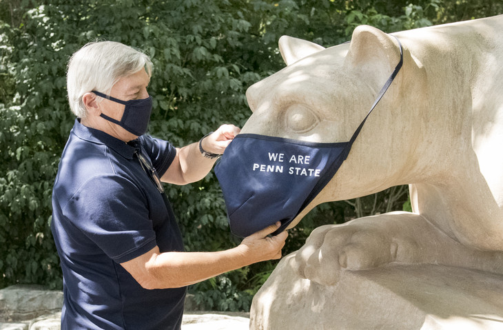 President Barron masking the lion shrine