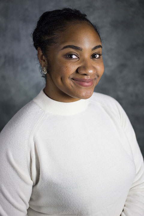 Studio headshot for Dejanae Gibson
