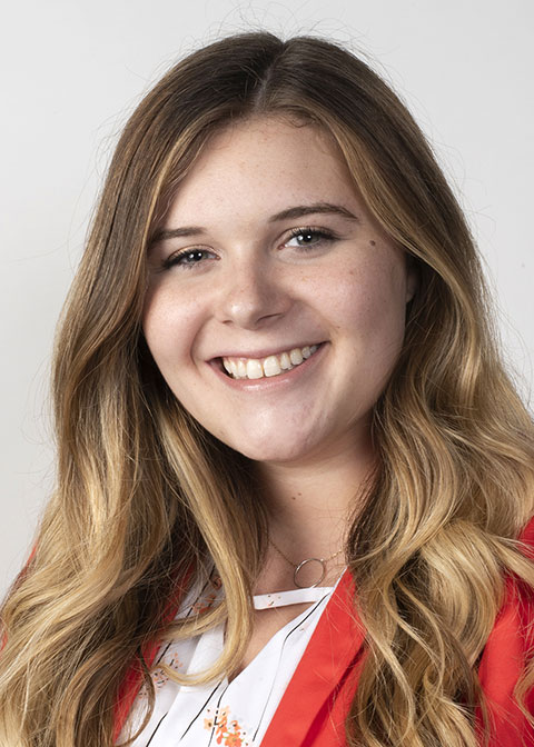 Studio headshot for Sam Gleason