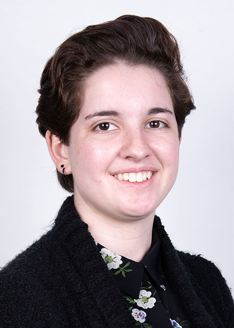 Studio headshot for Sydney Herdle