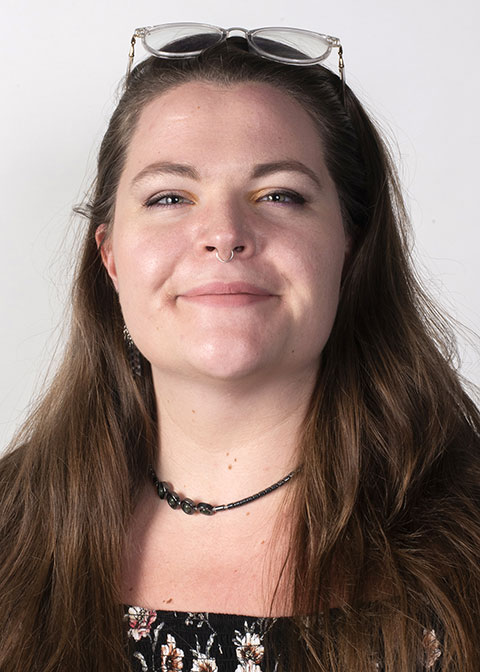 Studio headshot for Darcy Long