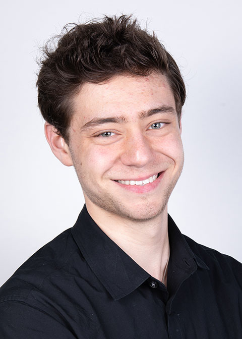 Studio headshot for Leo Massey