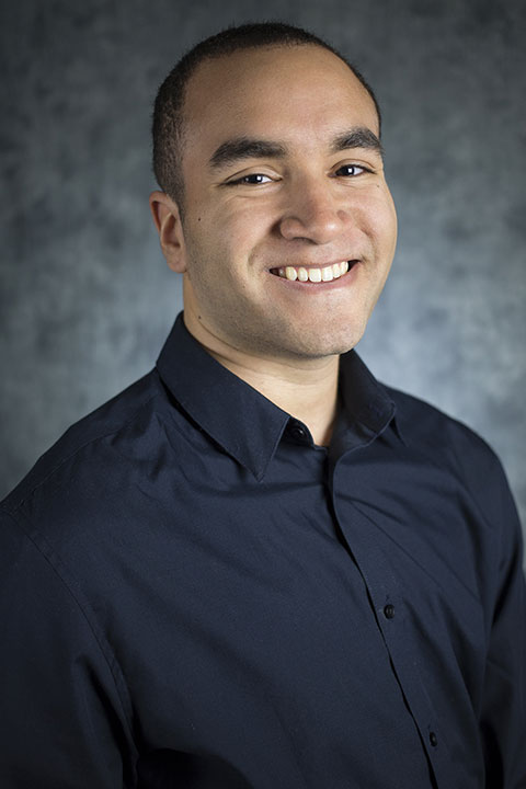Studio headshot for Mykael Hyman