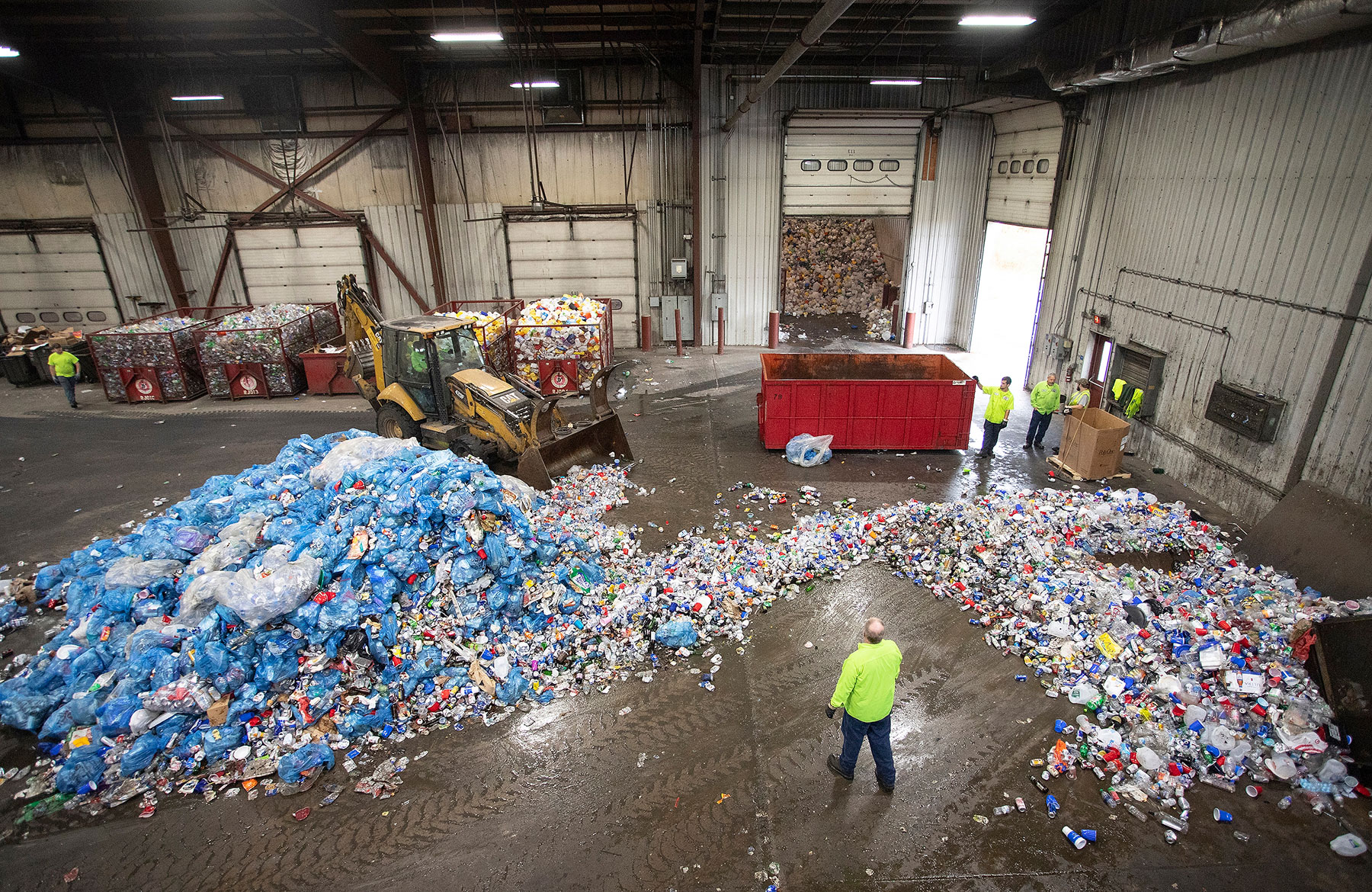 Inside photo at the local recycling center shows the sorting process that occurs after a game.